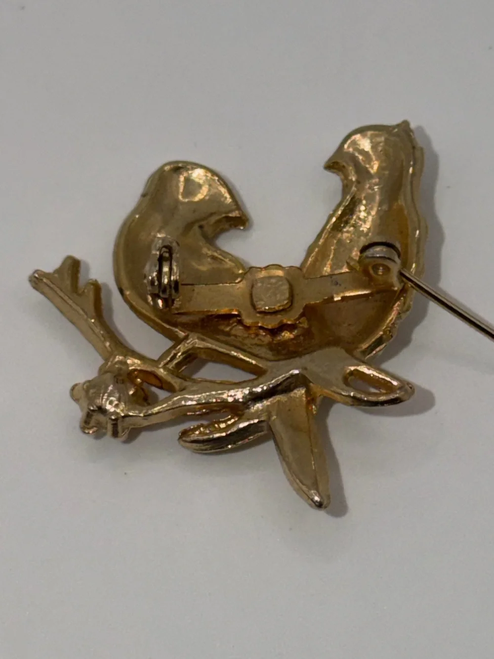 Gold-Tone Two Birds Brooch with Red Eyes and Pearl Accent